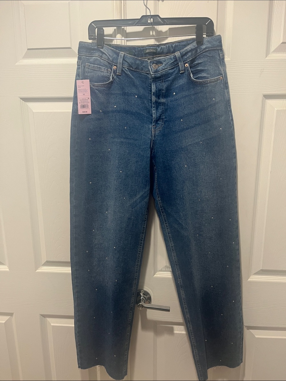 Women’s Dark Blue Straight-Leg Jeans with Subtle Embellishments.